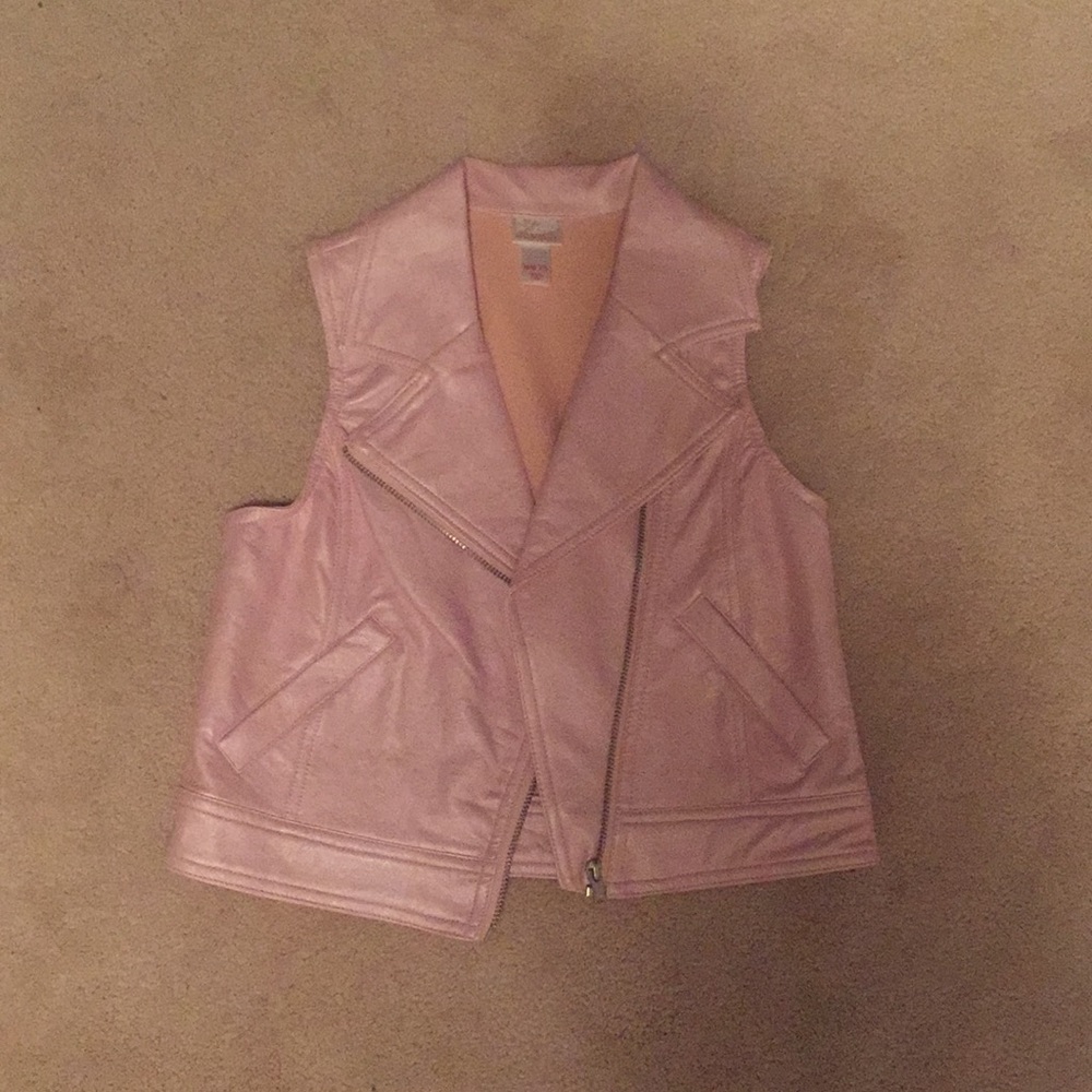 A like vinyl shimmery pink vest.